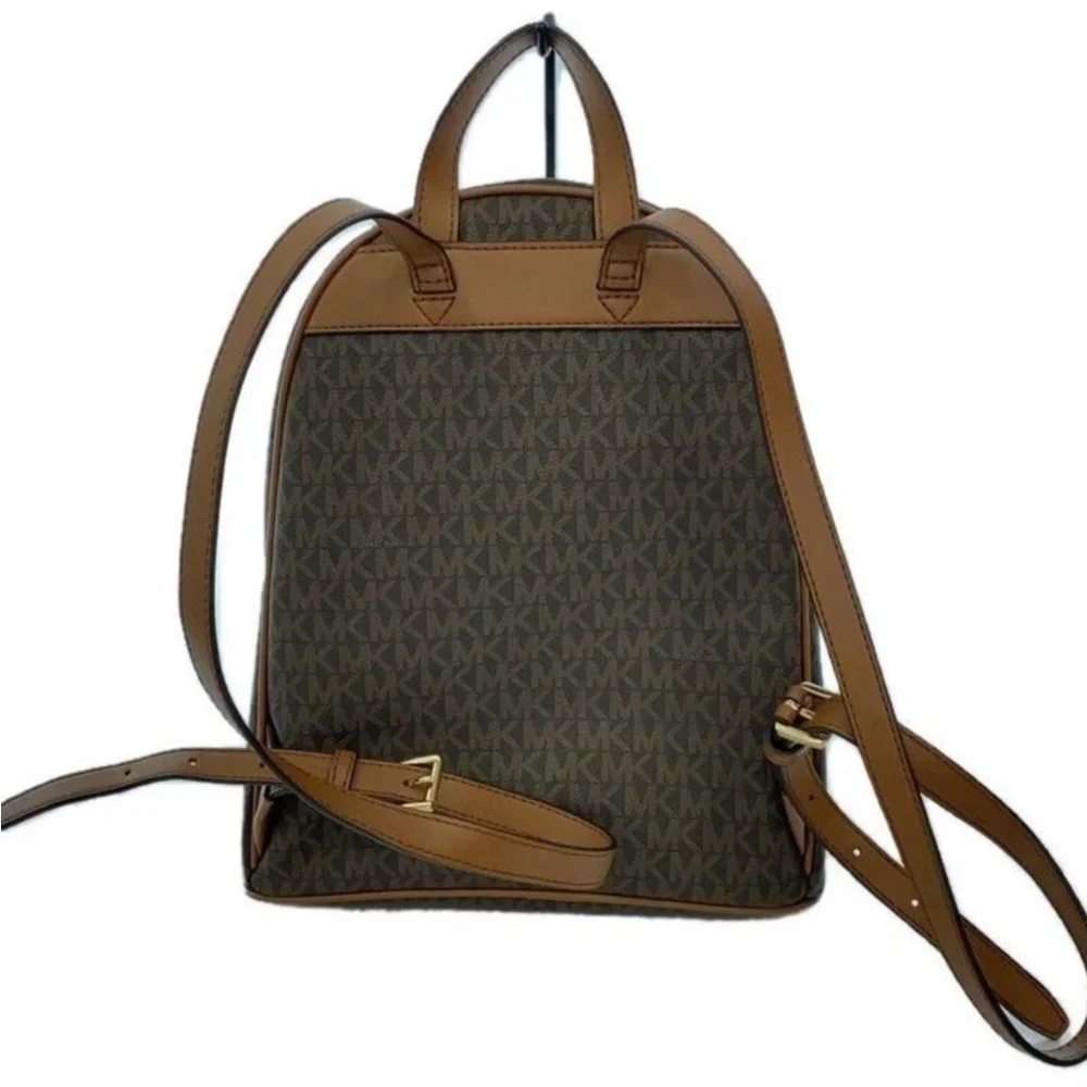 Michael Kors Brown Backpack with Aspen patches sherpa detail like new (RARE)